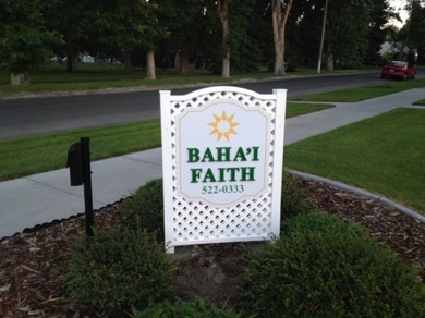 Sign on the corner of 9th Street and South Emerson Ave in Idaho Falls with information box 